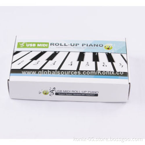 Some one play a folding roll up piano for learning